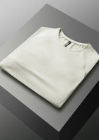 Folded grey shirt on a reflective surface