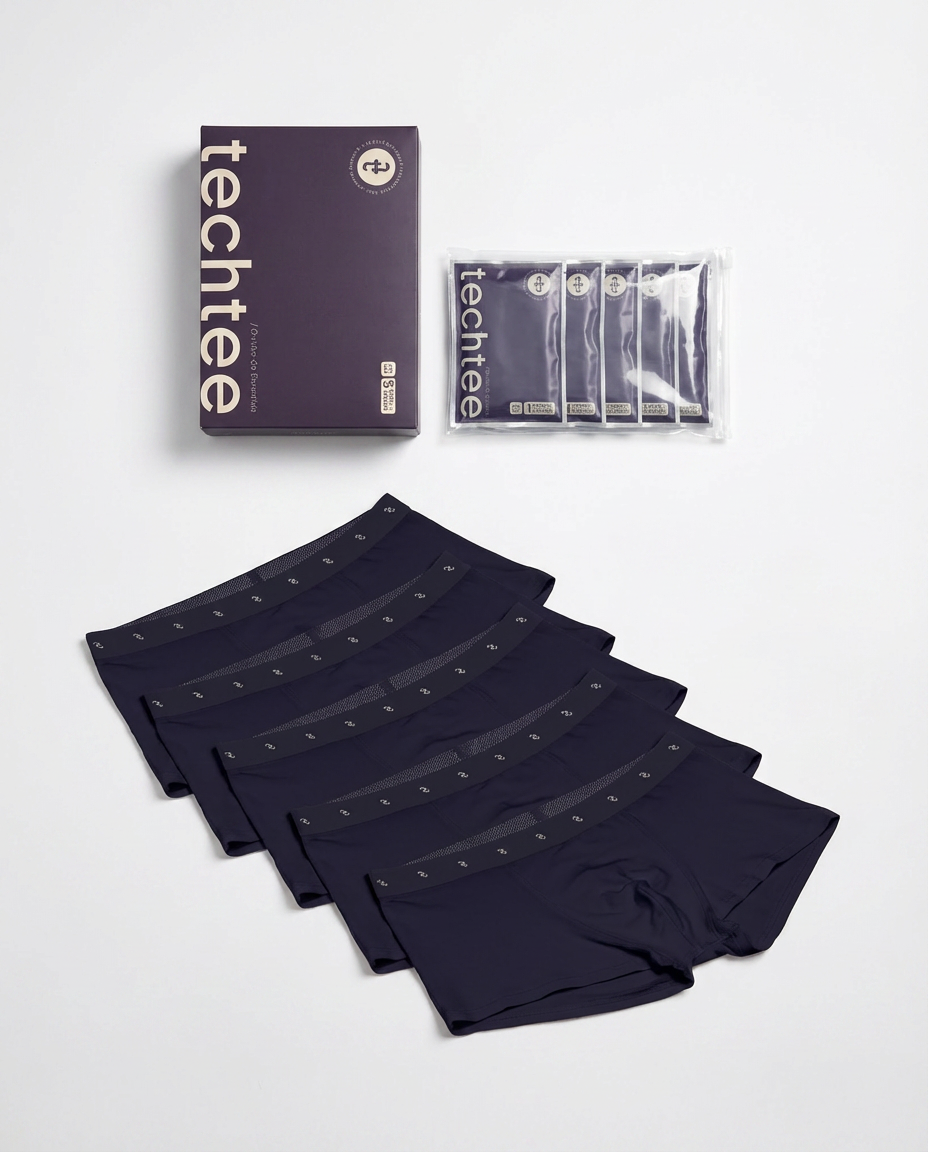 Set of navy blue boxer briefs with packaging on a white background