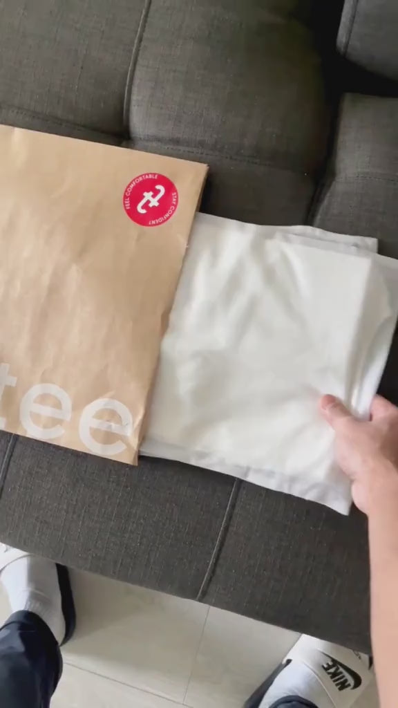 Influencer unboxing TechTee and styling the T-shirt in an OOTD look — performance basics for modern everyday wear