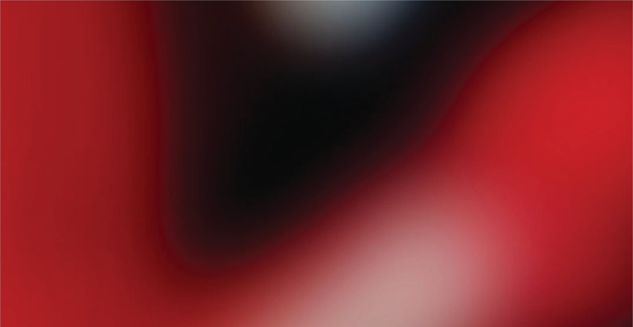Abstract gradient background transitioning from red to black